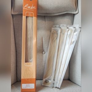 Hand tied weft extensions